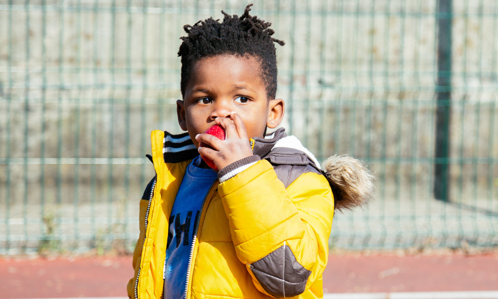 Child eating an apple
